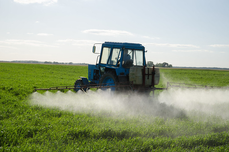 Pesticide spraying over field